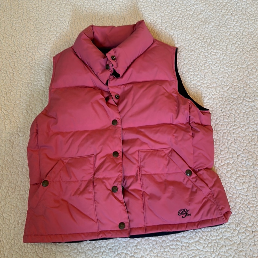 Pink and navy reversible snapped puffer vest